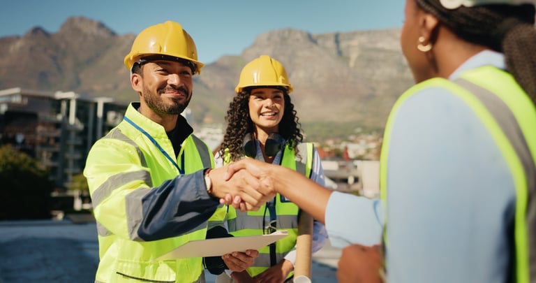 City, shaking hands or happy people in engineering project for funding, deal or construction
